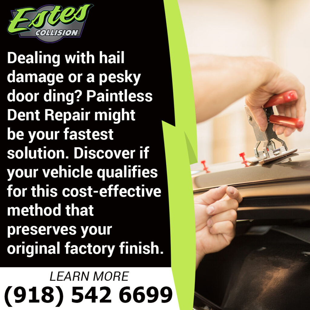 Paintless dent repair technician removing a small dent from a vehicle panel at Estes Collision while preserving the factory finish